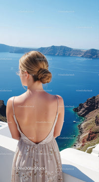 Woman enjoying stunning sea view on sunny day