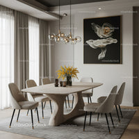 Elegant Modern Dining Room with Artistic Wall Art and Cozy Seating