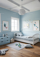 Light and Airy Children's Bedroom with Blue Walls and Playful Decor