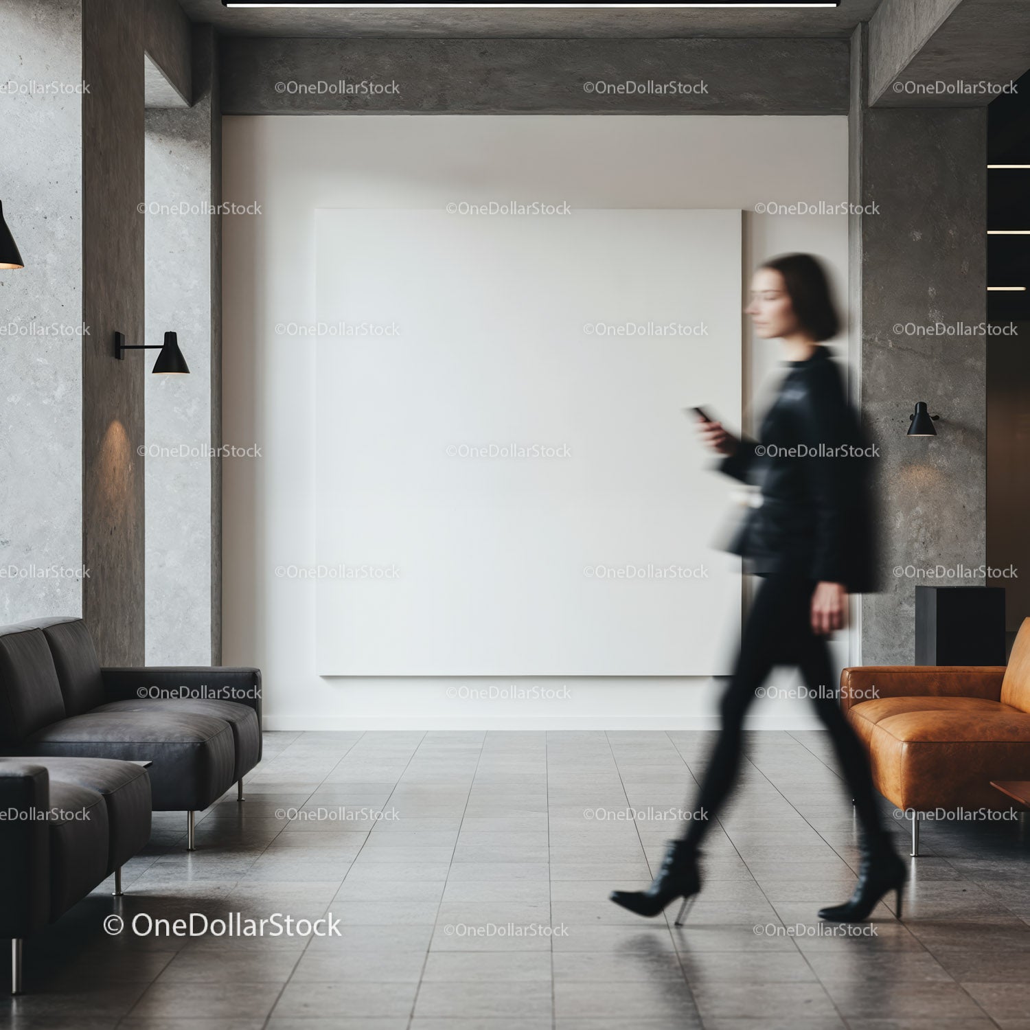 Blurred woman walking past spacious modern lobby seating
