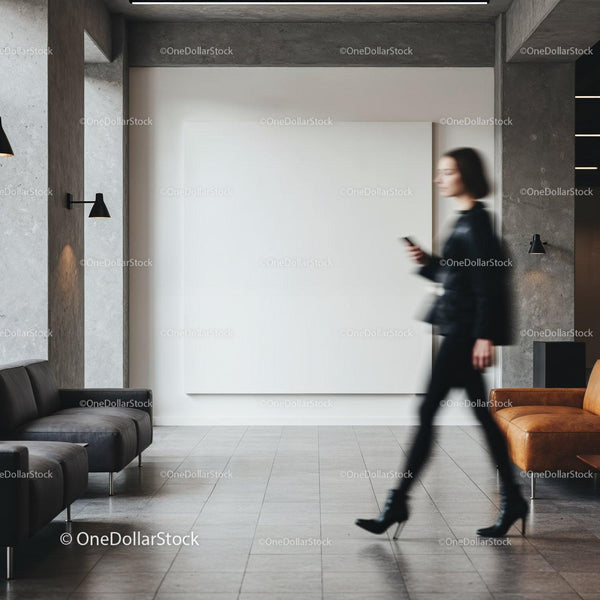 Blurred woman walking past spacious modern lobby seating JPG Mockup Image
