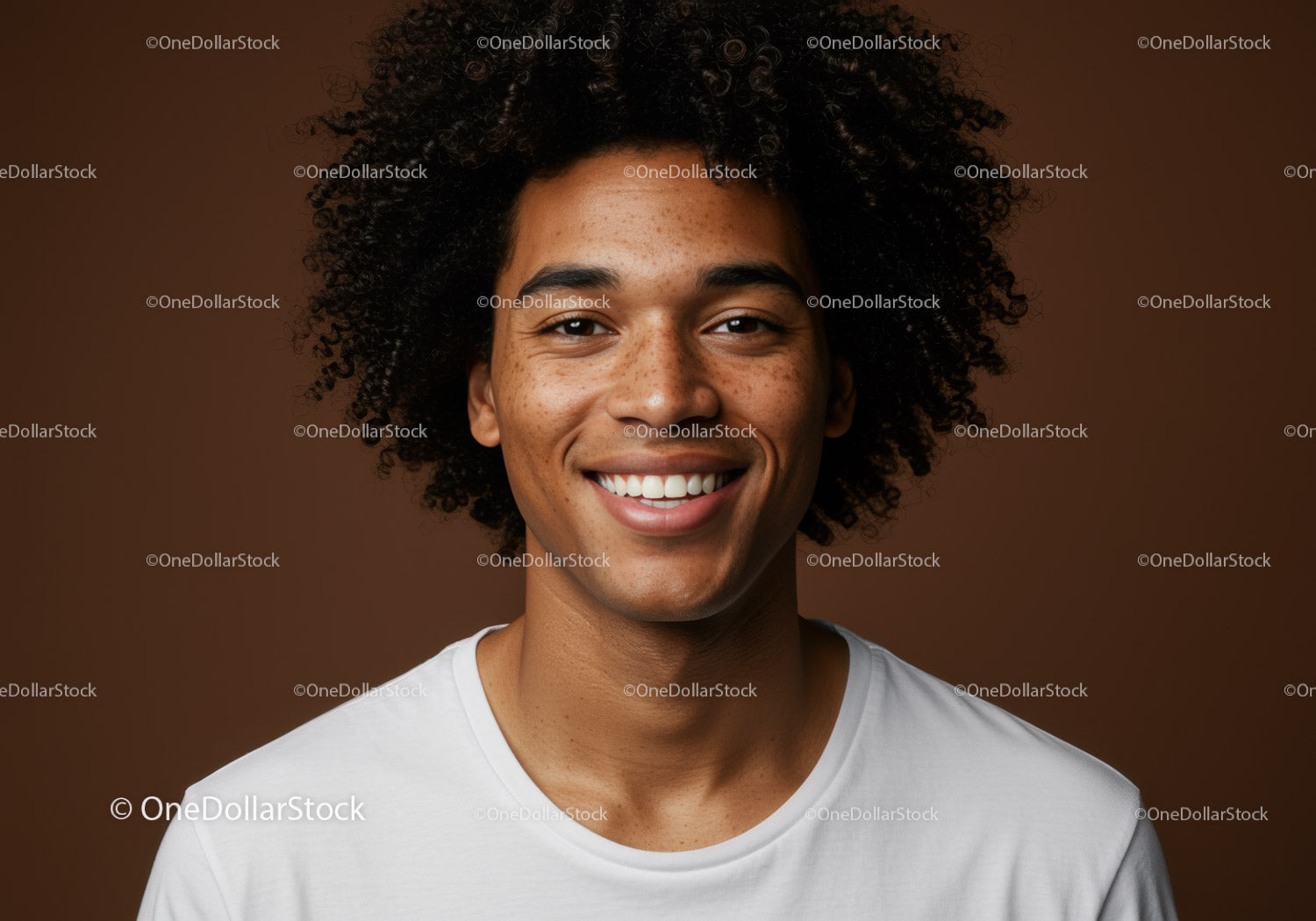 Confident Smiling Man Portrait with Natural Hair and Freckles