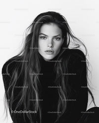 Elegant Black and White Portrait of a Young Woman with Wavy Hair