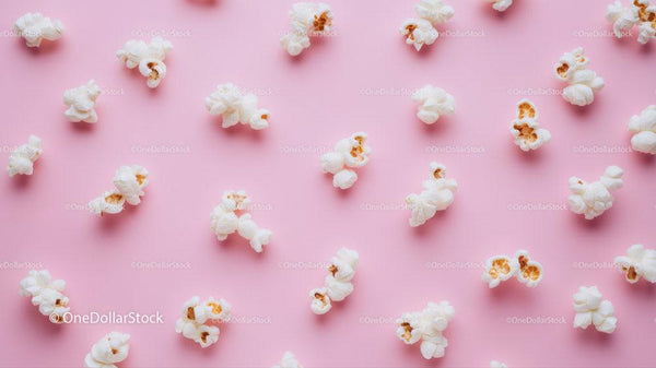 Fresh White Popcorn on Soft Pink Background for Movie Snacks