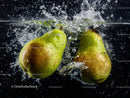 Fresh Pears Splash in Water with Dynamic Motion and Vibrant Colors