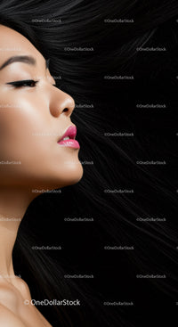 Side profile of serene woman with flowing dark hair