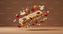 Granola Bar Surrounded by Nuts and Berries in Midair
