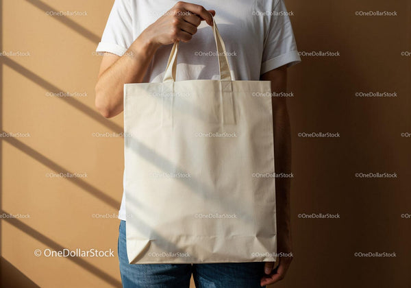 Person Holding Blank Eco Friendly Canvas Tote Bag JPG Mockup Image