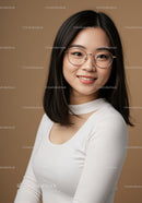Portrait of a Smiling Young Woman with Glasses in Casual Outfit