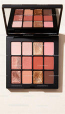 Makeup palette with soft warm and glittery shades