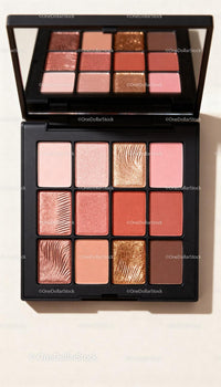 Makeup palette with soft warm and glittery shades