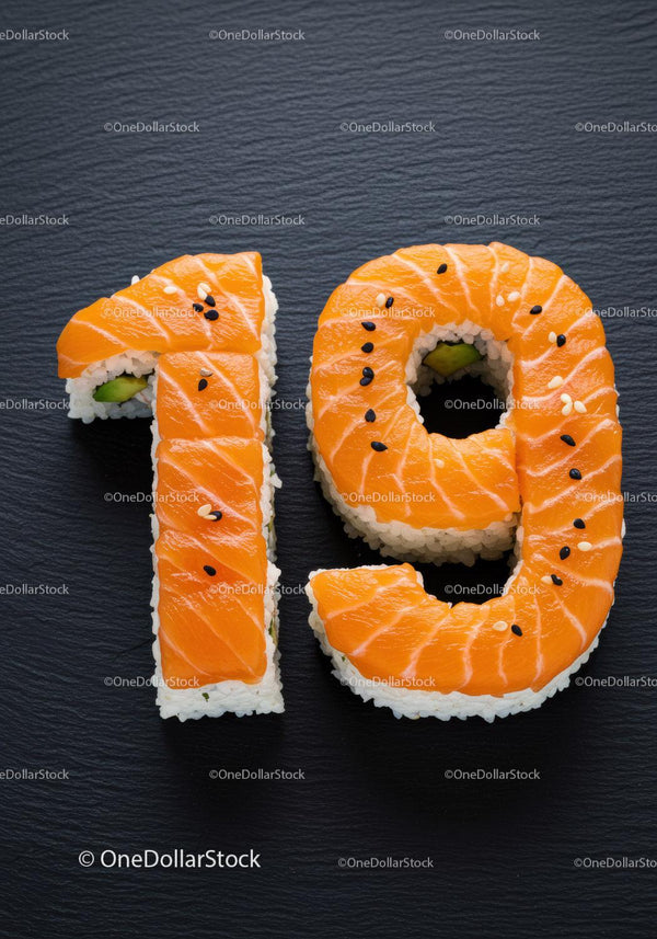 Sushi Rolls Forming Number Nineteen on Black Plate