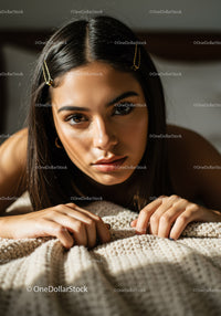 Intimate Portrait of a Young Woman with Expressive Eyes Amid Cozy Setting