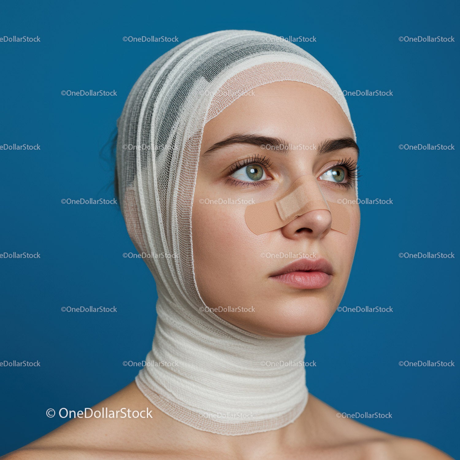 Elegant Woman with Bandaged Face in Skin Care and Healing Process