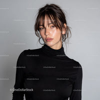 Stylish Woman Wearing Black Turtleneck and Hoop Earrings