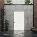 Minimalist white door in modern urban courtyard