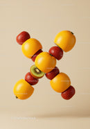 Creative arrangement of sliced citrus and strawberries