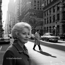 Elegant Senior Woman Walking Through Busy City Street in Black and White