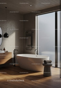 Modern minimalist bathroom with freestanding tub and natural light