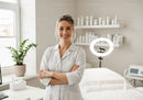 Smiling Female Healthcare Professional in Modern Medical Clinic