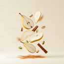 Floating pear slices with cinnamon and pistachios on light background