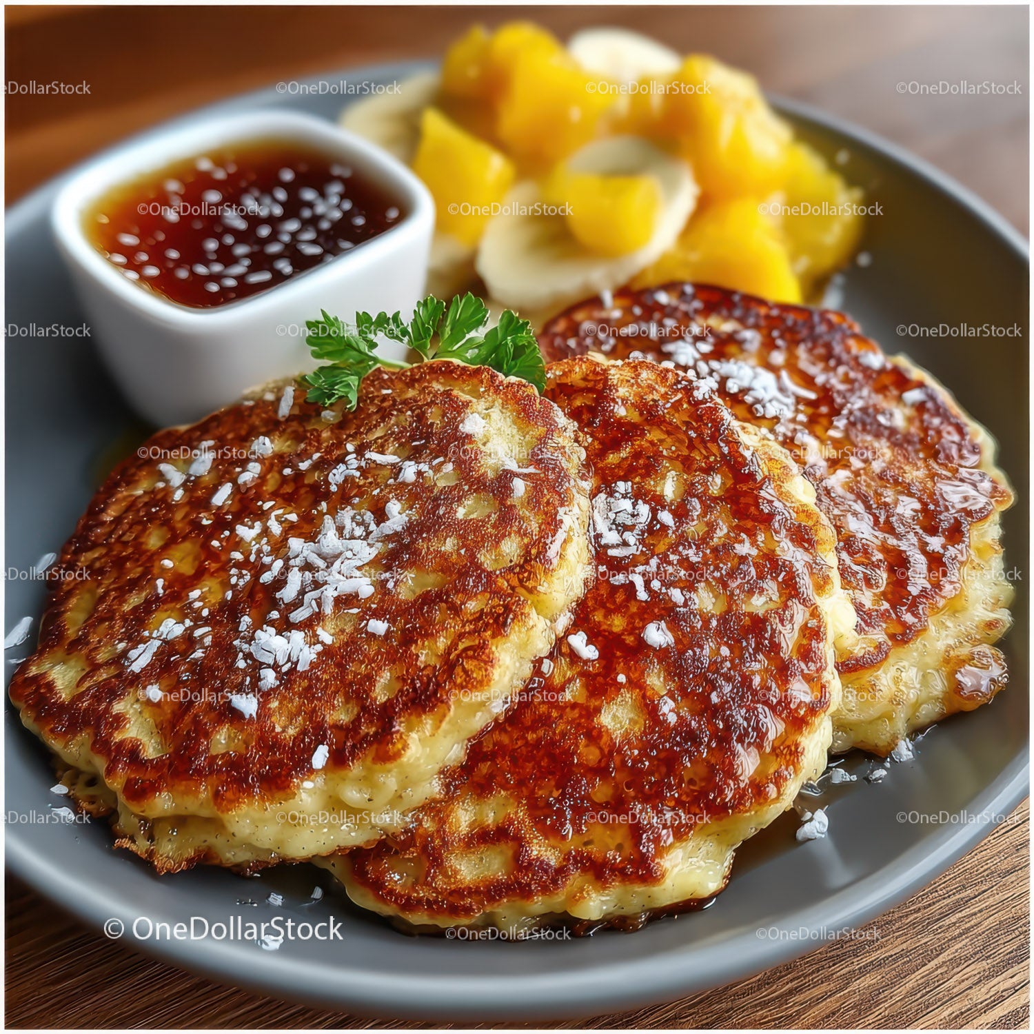 Crispy Golden Potato Pancakes with Berry Sauce and Sour Cream