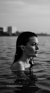 Serene Female Portrait in Water with Urban Background