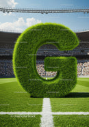 Green grass letter G on vibrant soccer field
