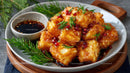 Crispy Fried Chicken with Sweet Soy Sauce Garnished with Pomegranate Seeds