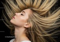 Blonde woman with flowing hair and closed eyes