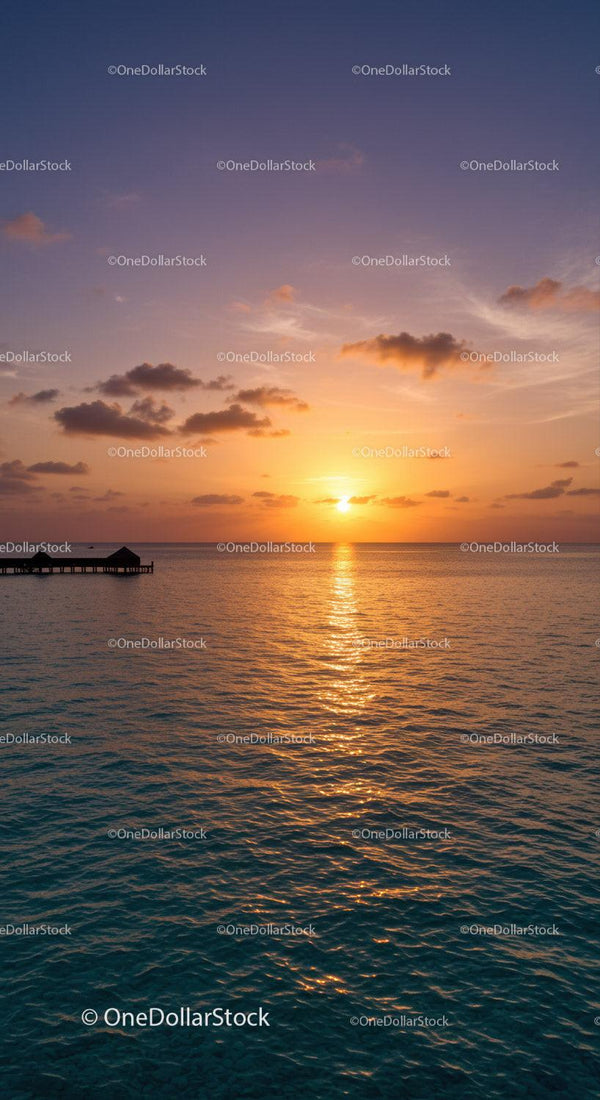 Beautiful Sunset Over Calm Ocean with Vibrant Sky