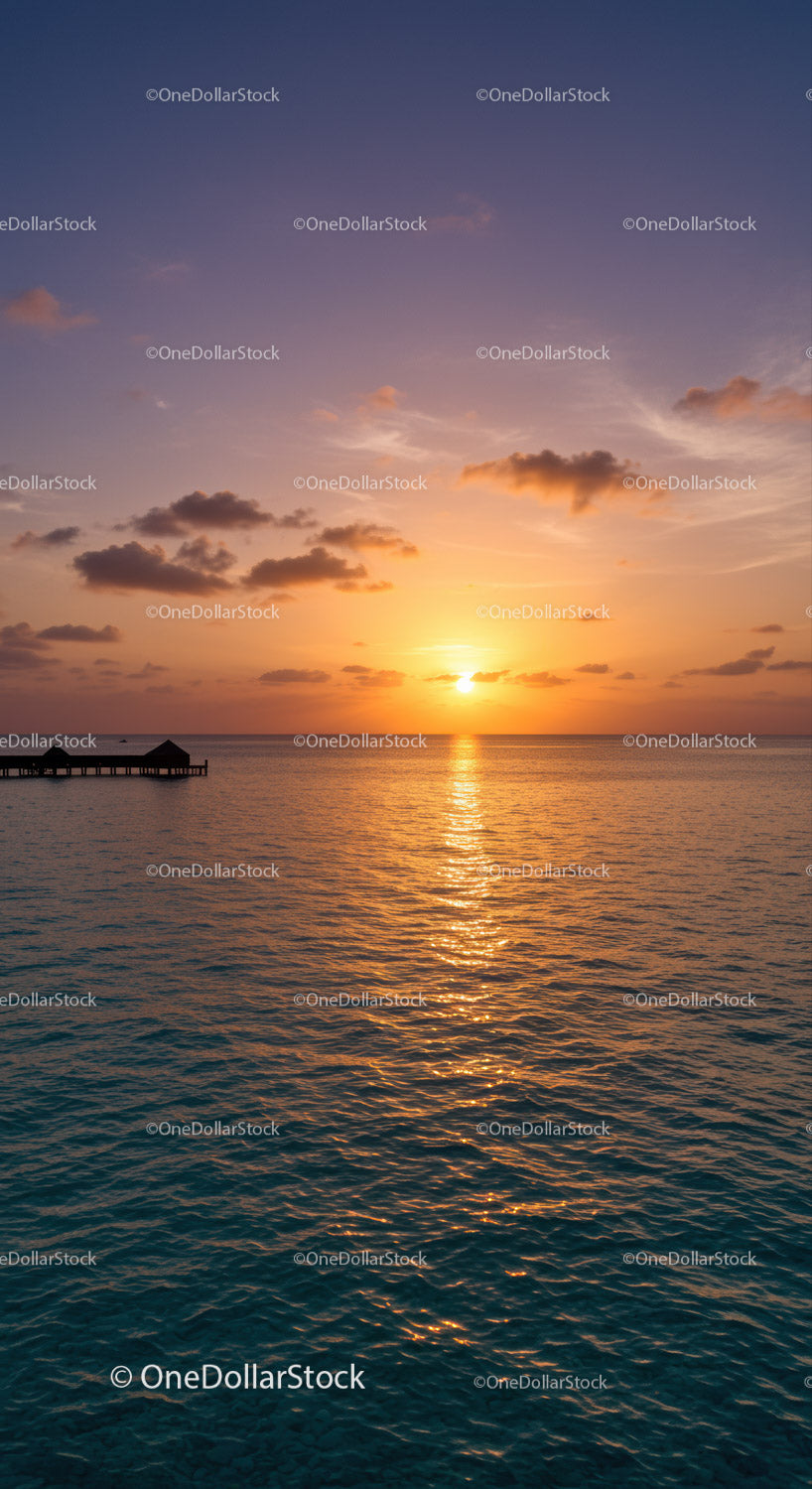 Beautiful Sunset Over Calm Ocean with Vibrant Sky