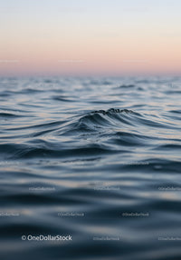Calm Ocean Waves at Sunset with Soft Pastel Sky