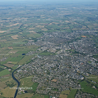 Aerial View of a Modern City with River and Green Spaces