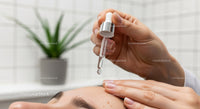 Woman Receiving Facial Serum Application with Droplet Dispenser