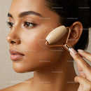 Young Woman Receiving Facial Massage with Jade Roller for Glowing Skin