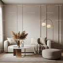 Minimalist living room with beige sofa and gold accents