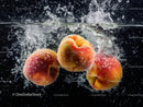 Fresh Peaches Splashing in Water with Splash Effect