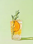 Refreshing Citrus and Rosemary Sparkling Drink in Glass
