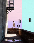 Man walking along urban brick wall with colorful sky