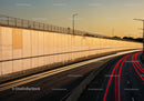 City Highway with Light Trails During Sunset in Urban Environment
