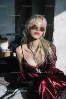 Stylish Woman Wearing Velvet Dress and Sunglasses in Fashion Portrait