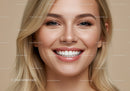 Close up of smiling woman with flawless skin and white teeth