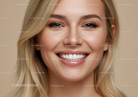 Close up of smiling woman with flawless skin and white teeth