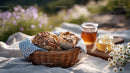 Outdoor Picnic with Fresh Baked Bread and Honey Jars in Sunlight