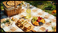 Fresh Picnic Spread with Sandwiches and Fruit Plate Outdoors