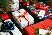 Festive Christmas gifts wrapped with colorful ribbons