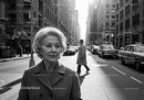 Elegant Senior Woman Walking on City Street in Black and White