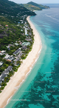 Tropical Beach with White Sand and Lush Green Mountains in Ocean View