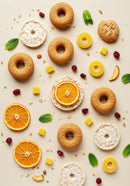 Assorted healthy snacks with dried orange and mint leaves